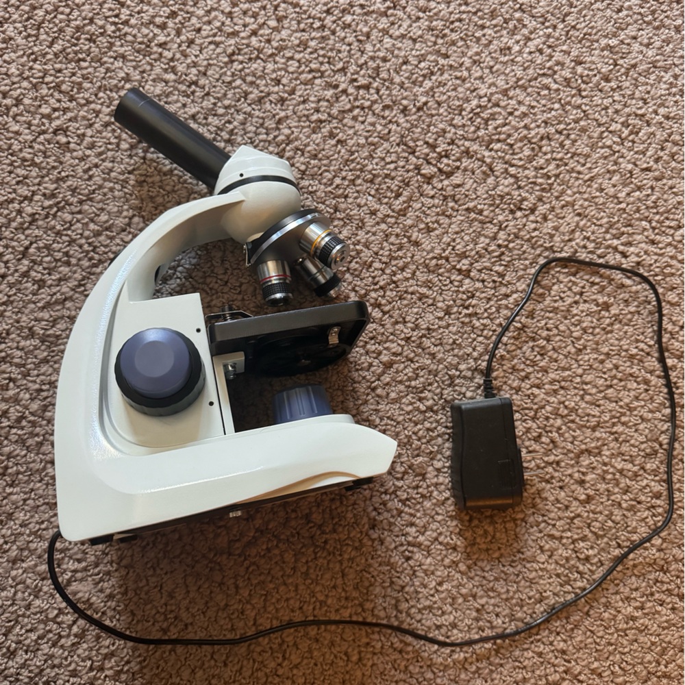 Compound microscope powered by a cord
